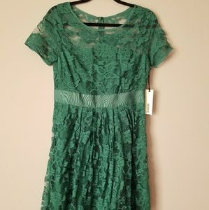Brand new green lace dress still with tags